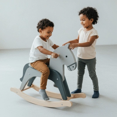 Diverse children playing with a rocking horse